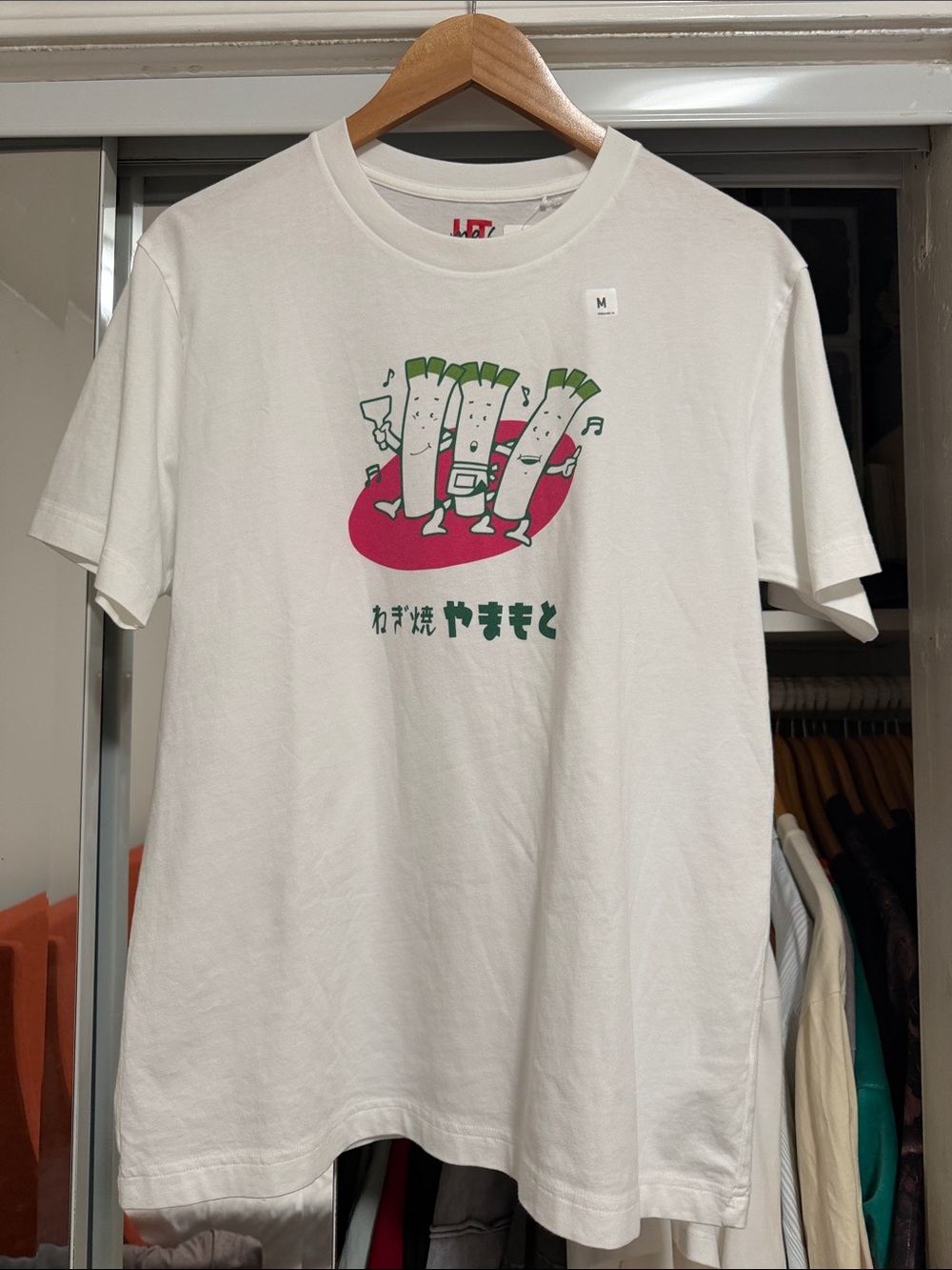 White Graphic unisex T-Shirt with Green Cartoon Print
